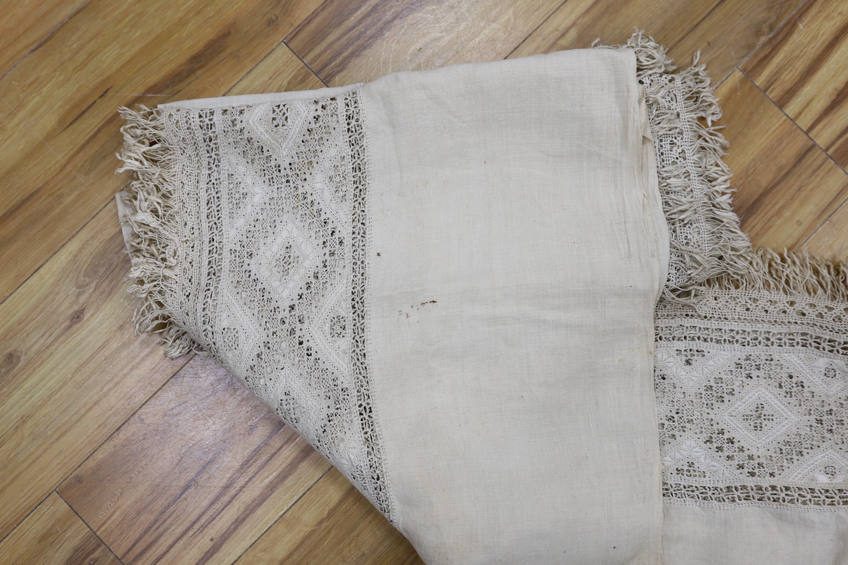 A pair of 19th century Greek hand worked and embroidered linen pelmets, 440cms long (each)